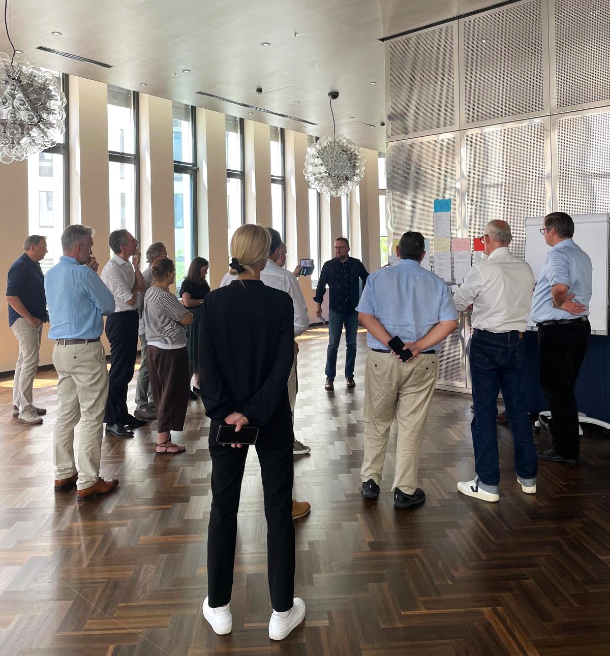 RNE Managing Board Strategy Meeting - Members standing in a room