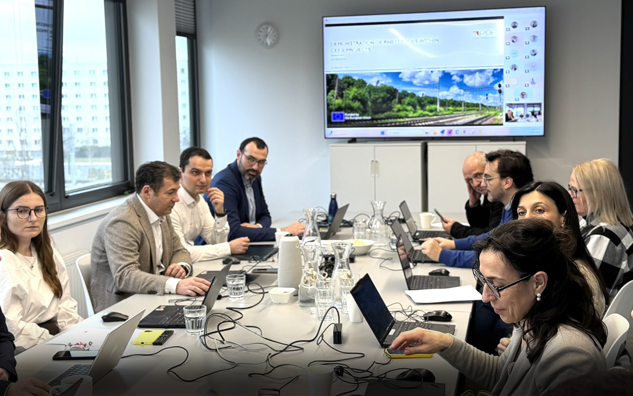 people sitting around a table in a meeting